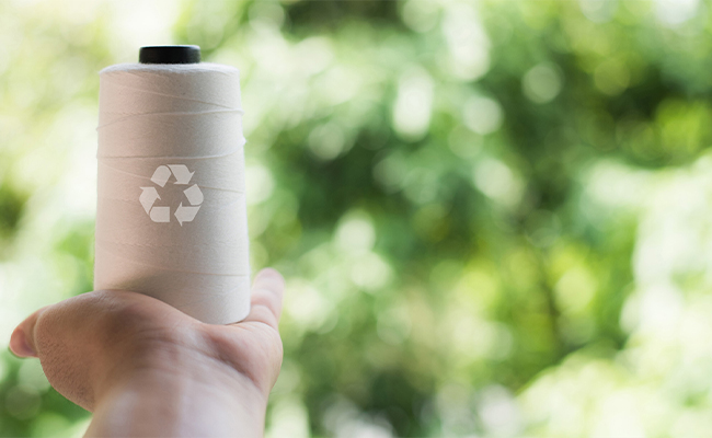 Ang berdeng kalsada ng environmentally friendly na sinulid
